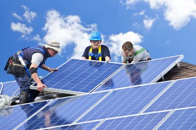 Man installing Solar Panel