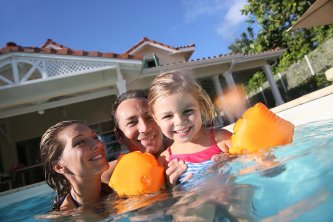 family in pool